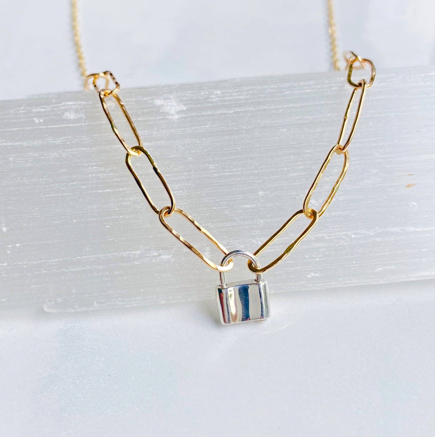 Hand forged link choker with lock